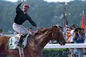 Pat Day Celebrating Atop Easy Goer