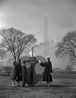 Pat Nixon Near Statue in Park With Youngsters