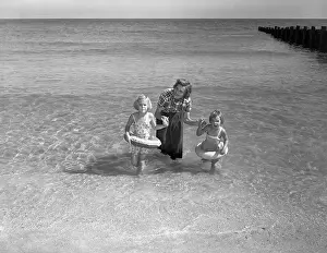 Pat Nixon Playing with Daughters at Beach