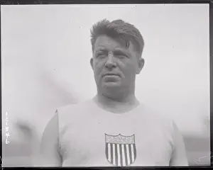 Prints of (Original Caption). Antwerp, Belgium: Pat Ryan of USA during Olympics Capturing Glory: A Journey Through Olympic History: Pat Ryan Posing at Olympic Games