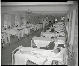 Patients Lying in Hospital Beds