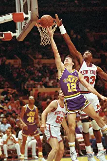 Patrick Ewing Blocking John Stockton from Scoring Basetball