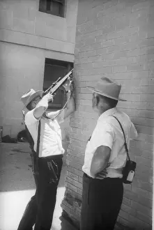 Austin Prints: Patrolman Looking Through Scope on His Rifle