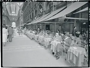 Milan Prints: Patrons Eating at Outdoor Tables of Food Establishment