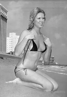 Patti Mac Ties Her String Bathing Suit
