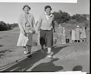 Patty Berg and Estelle Lawson Page Walking Holding Hands