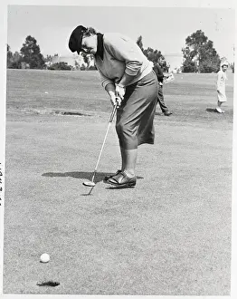 World Record Prints: Patty Berg Putting W/Ball In Foreground
