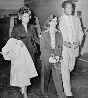 Patty Hearst Being Escorted by Federal Agents