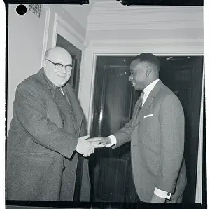 Paul Henri Spaak Shaking Hands with Cyrille Adoula