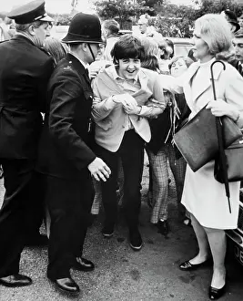 Beatles Prints: Paul McCartney Squeezing Through Crowd