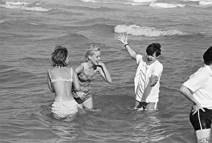 Splashing Prints: Paul McCartney Wading with Florida Girls