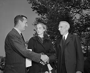 Paul Mellon with Wife Shaking Hands with Dr. Bowman