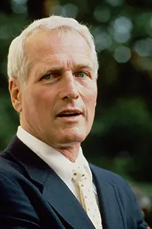 Prints of CAMBRIDGE, MA - JULY 1987: Paul Newman helps Gary Hart campaign for President at the home of Laurence Tribe, a legal scholar and professor at Harvard University in Cambridge, MA in July, 1987 Iconic Movie Star Prints (1920s–1970s): Paul Newman