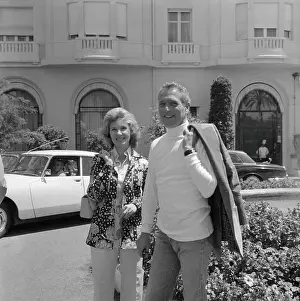 Paul Newman and Joanne Woodward Walking Hand in Hand