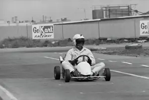 Prints of American actor Paul Newman, the visor of his crash helmet obscuring his face, driving a go-kart at the Go Kart Raceway, in the grounds of the Go Kart factory in Azusa, California, August 1962 Paul Newman: A Life in Frames: Paul Newman, Go Kart Raceway, Azusa, California