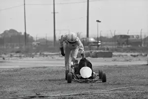 Prints of American actor Paul Newman stands from his go-kart after racing at the Go Kart Raceway, in the grounds of the Go Kart factory in Azusa, California, August 1962 Paul Newman: A Life in Frames: Paul Newman, Go Kart Raceway, Azusa, California