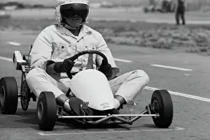 Prints of American actor Paul Newman, the visor of his crash helmet obscuring his face, driving a go-kart at the Go Kart Raceway, in the grounds of the Go Kart factory in Azusa, California, August 1962 Paul Newman: A Life in Frames: Paul Newman, Go Kart Raceway, Azusa, California