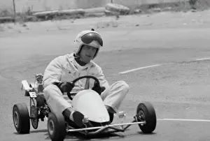 Prints of American actor Paul Newman, wearing a crash helmet with the visor raised, driving a go-kart at the Go Kart Raceway, in the grounds of the Go Kart factory in Azusa, California, August 1962 Paul Newman: A Life in Frames: Paul Newman, Go Kart Raceway, Azusa, California