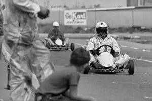 Prints of American actor Paul Newman, the visor of his crash helmet obscuring his face, driving a go-kart at the Go Kart Raceway, in the grounds of the Go Kart factory in Azusa, California, August 1962 Paul Newman: A Life in Frames: Paul Newman, Go Kart Raceway, Azusa, California