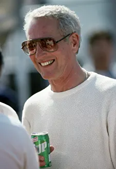 Prints of LONG BEACH, CALIFORNIA - APRIL 13 : Actor Paul Newman at Toyota Long Beach Grand Prix race, April 13, 1985 in Long Beach, California. (Photo by Bob Riha, Jr./Getty Images) Iconic Movie Star Prints (1920s–1970s): Paul Newman at Toyota Long Beach Grand Prix Race 1985