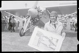 Hartford Prints: Paul Poberenzy Holding Photograph of Charles A. Lindbergh