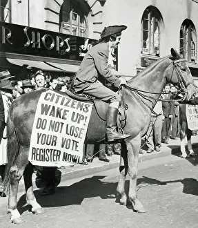 Paul Revere Impersonator Pausing on Horseback