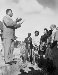 Eugene Prints: Paul Robeson Gesturing While Singing to Audience