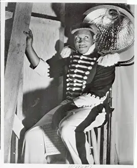 Paul Robeson Relaxing in Stage Costume
