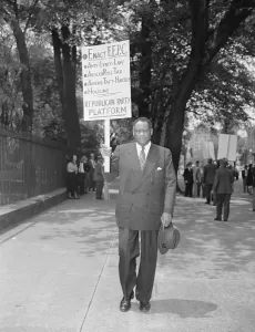 Racism Prints: Paul Robeson Walking with Sign on Capitol Street