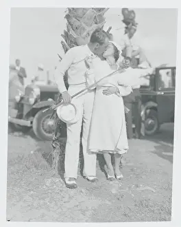 Paul Runyan and Wife Kissing