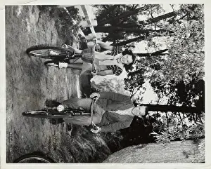 Paulette Goddard and Douglas Fairbanks Jr Riding Bicycles