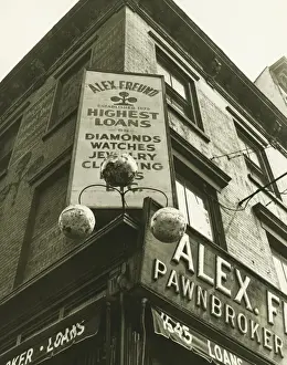 City Location Prints: Pawnbroker sign on building corner, (B&W), low angle view