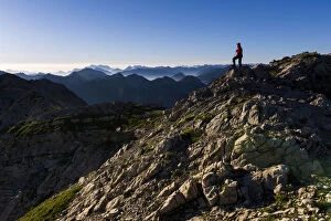 Images Dated 5th September 2016: Peaks of the Allgau Alps in the early morning with a hiker, Oberstdorf, Bavaria, Germany
