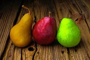 Images Dated 30th January 2016: Three Pears on old wooden surface
