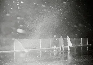 Pedestrians on Boardwalk During Hurricane Water Surge