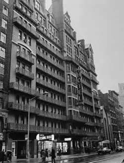 Pedestrians Walking in Front of Large Hotel Chelsea