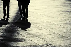 Sidewalk Prints: Pedestrians walking against the light, Berlin, Germany, Europe