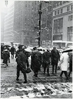 Corner Prints: Pedestrians Walking in Snowstorm