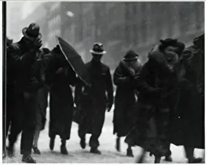 Pedestrians Walking on Windy Day