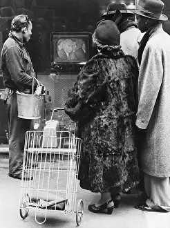 Investigating Prints: Pedestrians Watch TV in Store Window