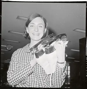 Peggy Fleming Holding Ice Skates