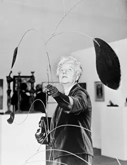 Peggy Guggenheim Adjusts A Mobile