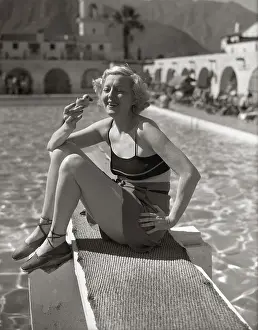 Peggy Hopkins Joyce Sitting on Diving Board