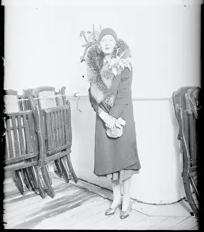 Peggy Joyce Standing on Deck of Ship