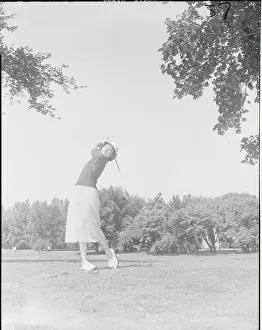 Peggy Kirk Driving Golf Ball