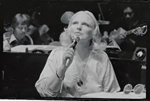 Peggy Lee Singing into Microphone