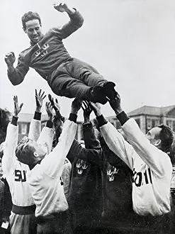 Gold Medal Prints: Pentathlon Winner Celebrating with National Team