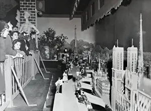 People Admiring a City Model of Paris