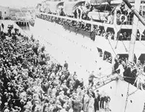 People Boarding a Ship