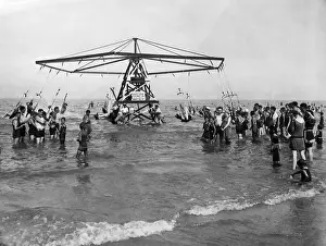 Amusement Park Prints: People on carousel in sea